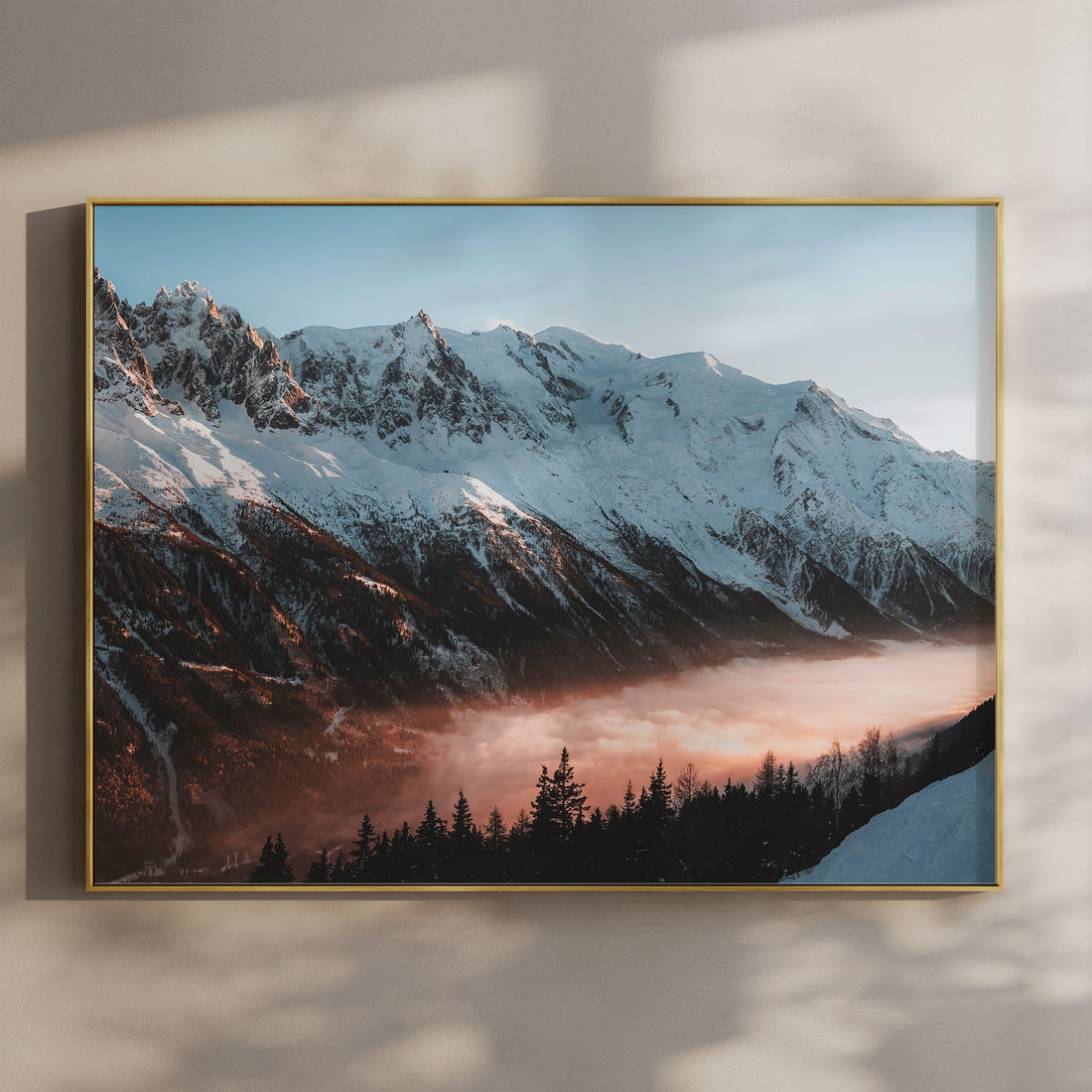 Mont Blanc sunset wall art print capturing golden light on the snowy peaks above Chamonix forest.