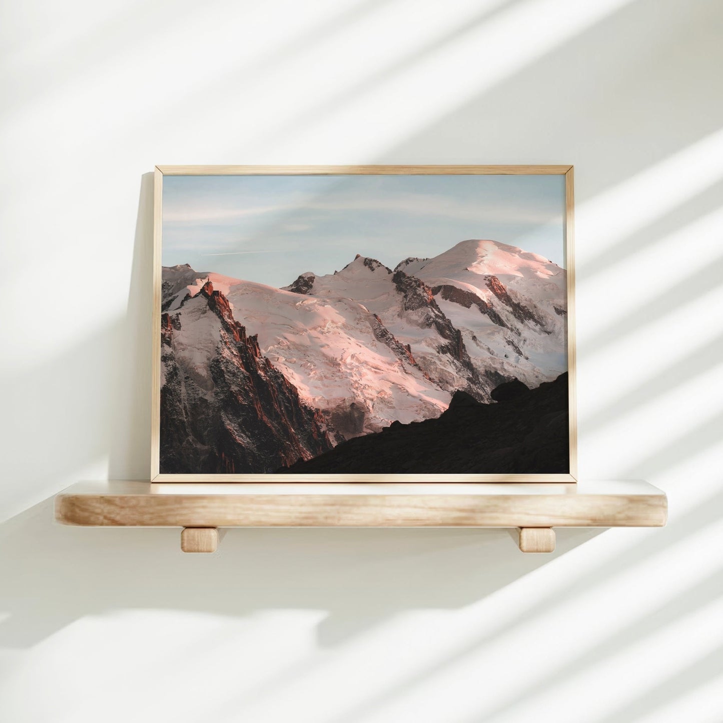 Minimalist mountain art of the Mont Blanc Massif with soft snowy tones and dramatic evening shadows.