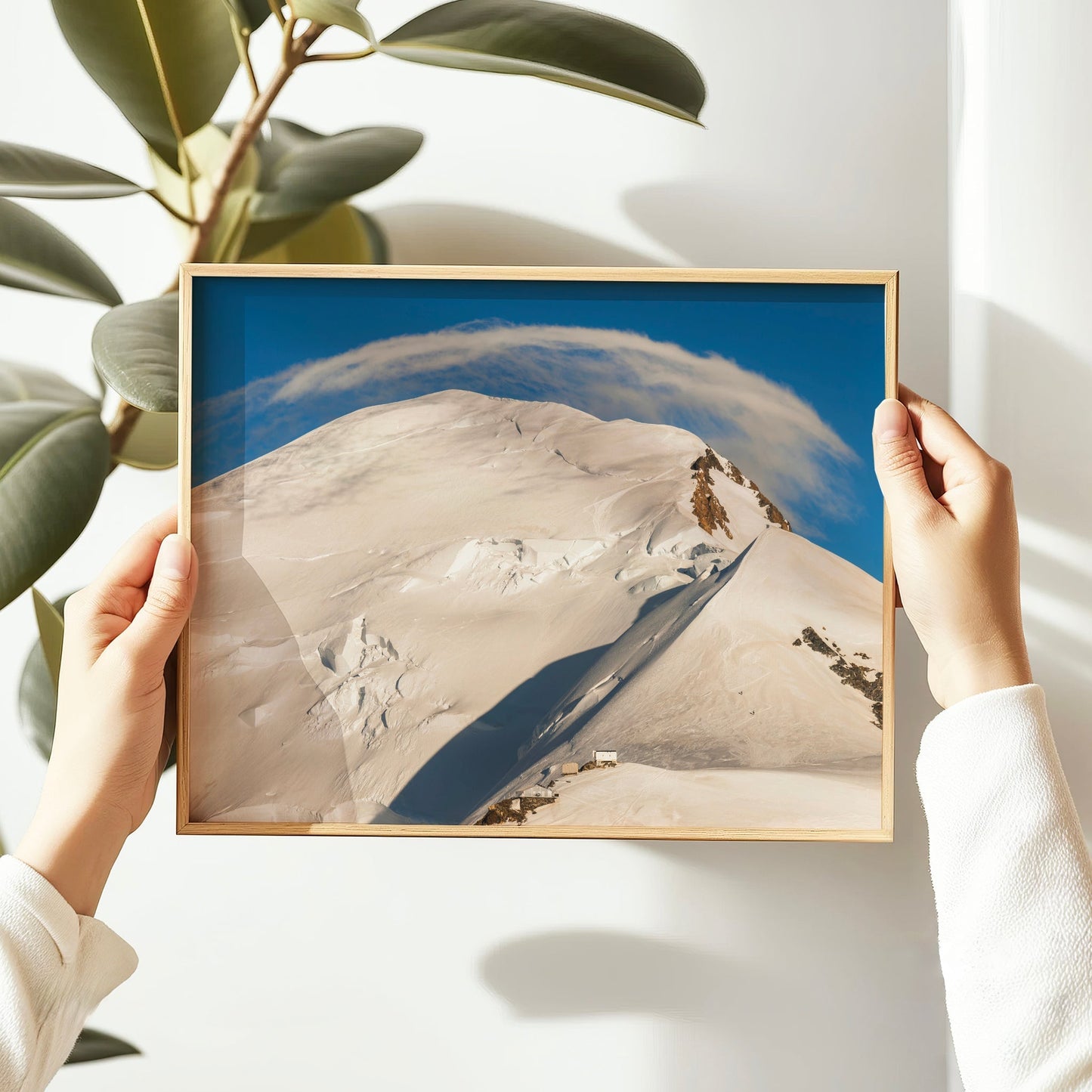 Striking minimalist photograph of Mont Blanc’s windswept summit route, ideal for mountain lovers and modern spaces.