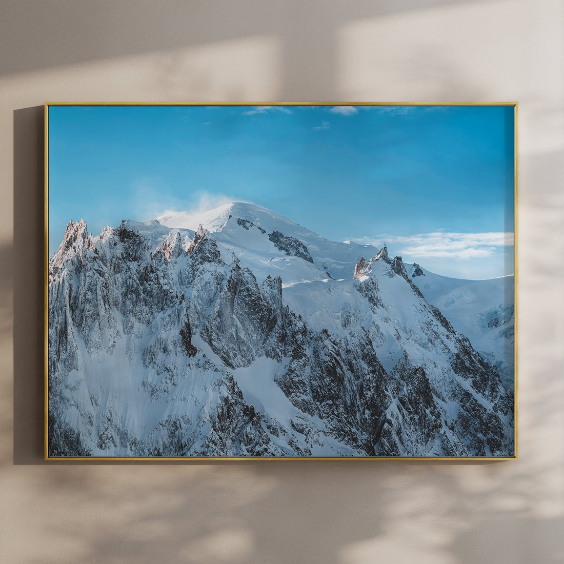 Fine art Mont Blanc wall print showing snow-covered peaks under a bright blue alpine sky.
