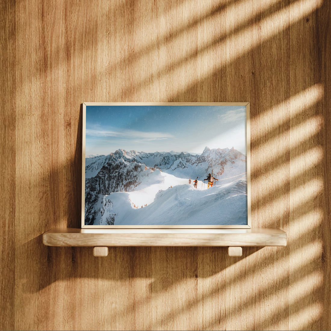 Mont Blanc wall art print showing climbers and skiers descending a dramatic high mountain snow ridge.