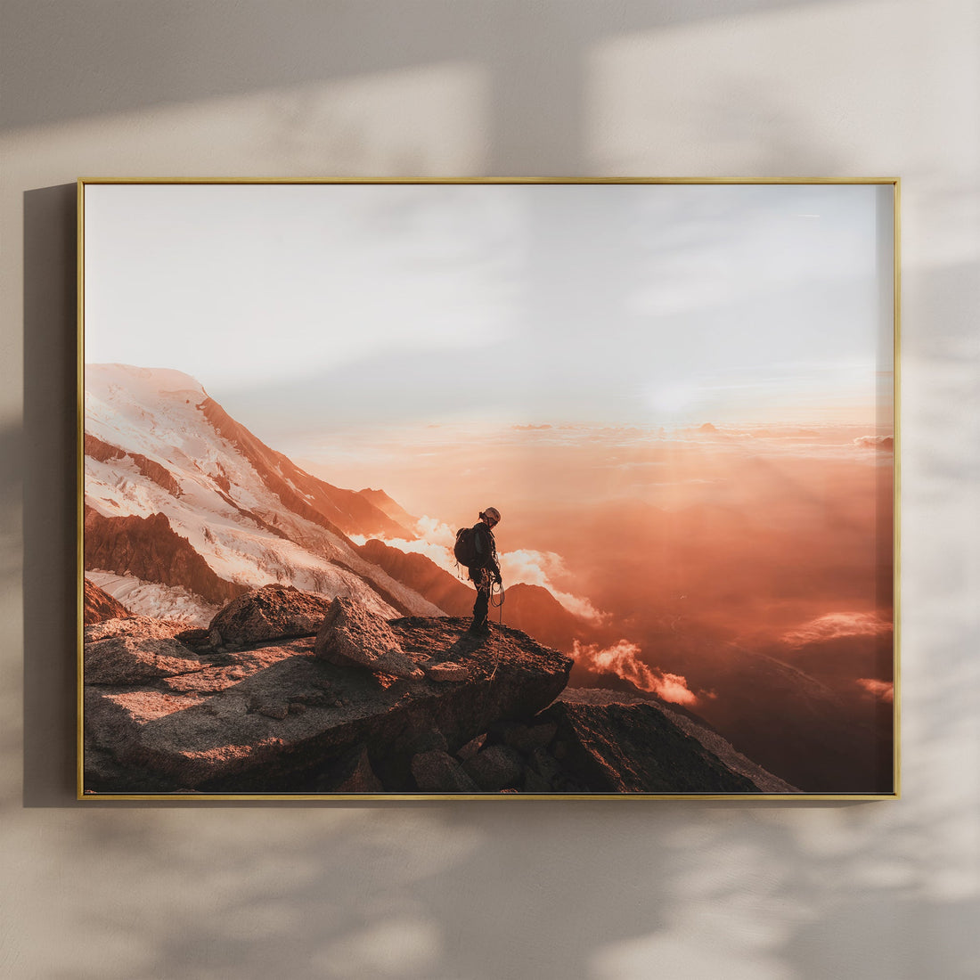 Stunning Mont Blanc summit climbing print featuring a lone mountaineer overlooking a golden sunrise.