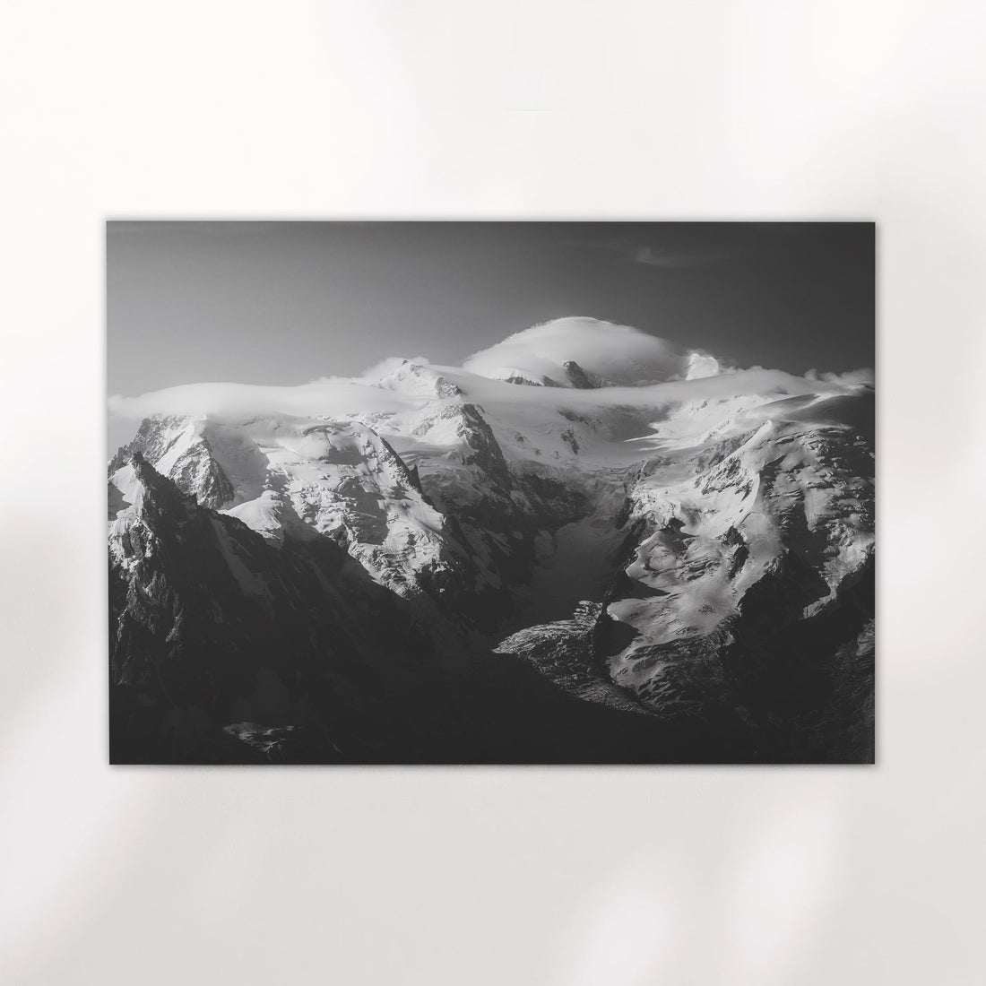 Breathtaking fine art print of Mont Blanc's summit wrapped in clouds, perfect for mountain lovers.