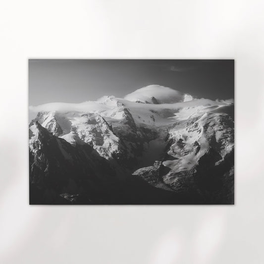 Breathtaking fine art print of Mont Blanc's summit wrapped in clouds, perfect for mountain lovers.