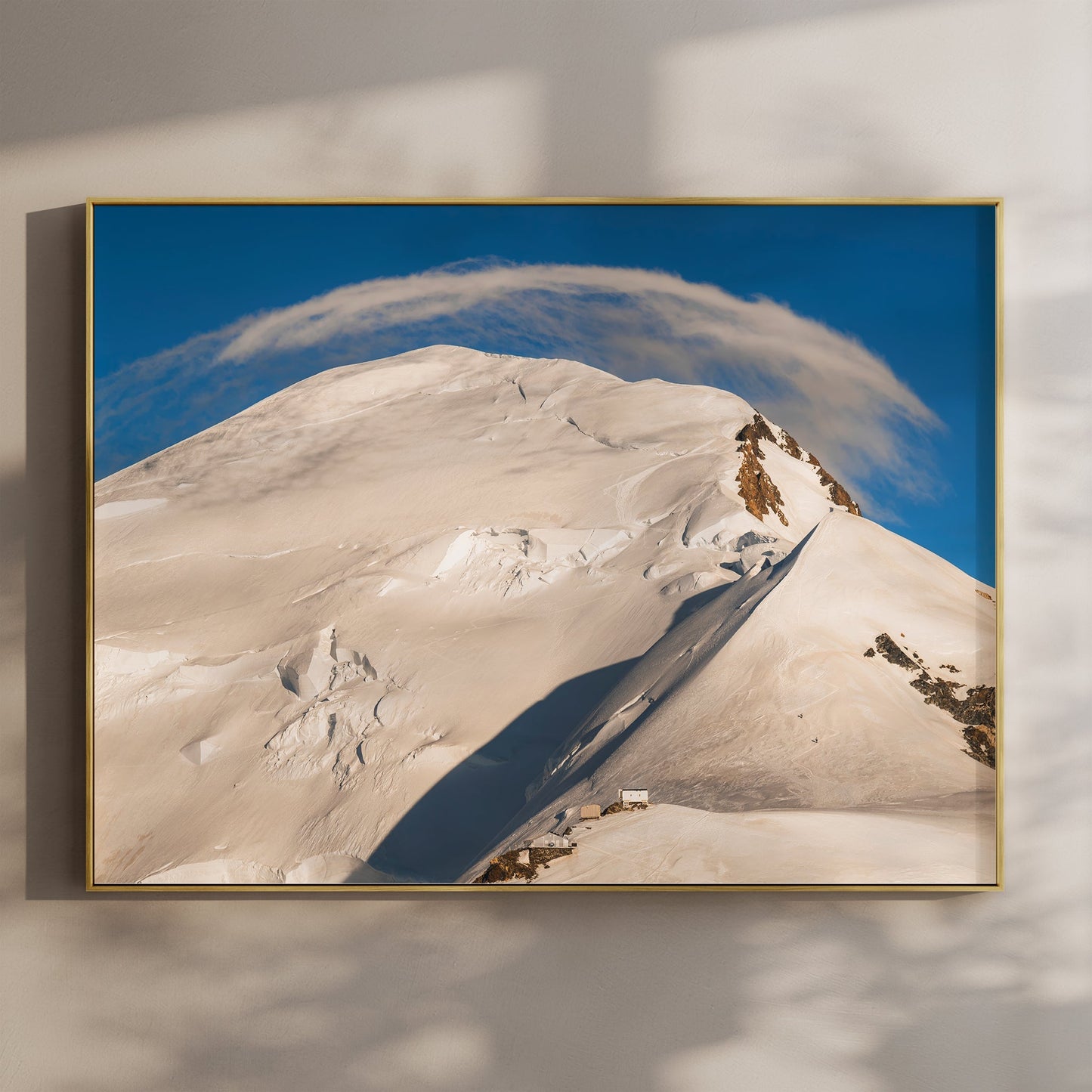 Fine art wall print of Mont Blanc’s summit route under clear skies with dramatic snow ridges and alpine shadows.