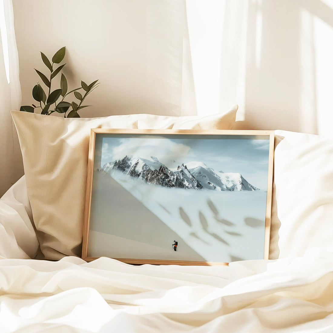 Elegant Mont Blanc summit trek wall print highlighting a ski tourer in a breathtaking high-altitude snowfield.