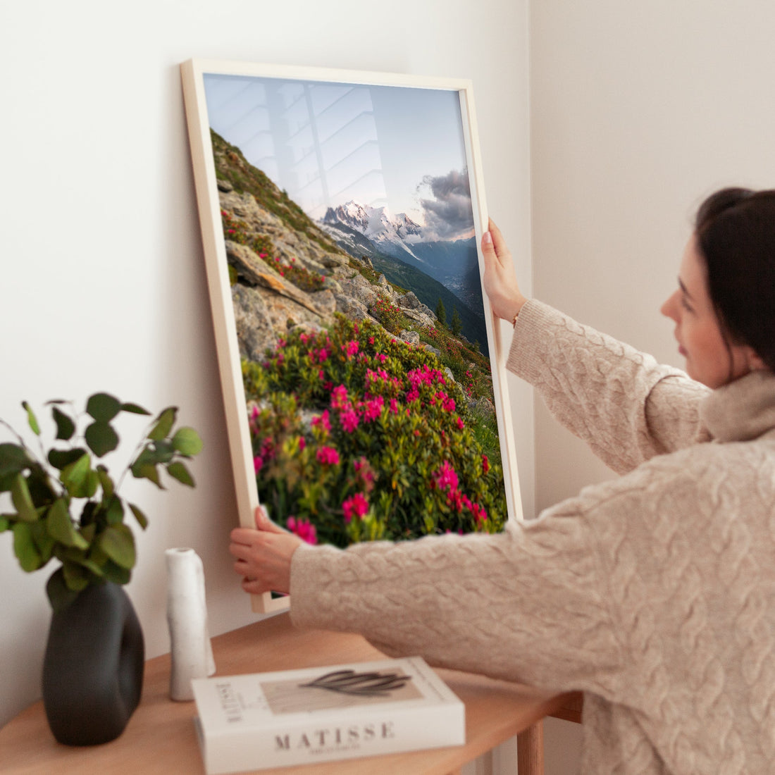 A mesmerizing nature art print of Mont Blanc, overlooking the valley with dramatic clouds and vibrant flora.