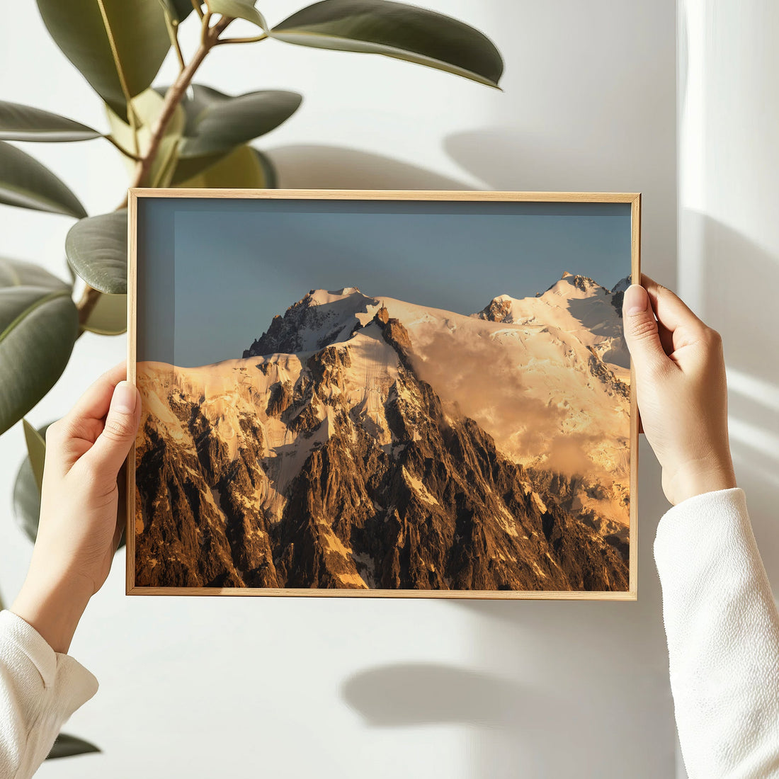 Mont Blanc wall art showing golden light over Aiguille du Midi and surrounding alpine peaks at dawn.