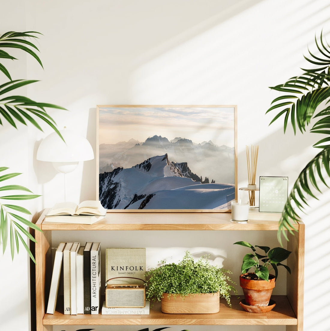 Framed mountain print of Mont Maudit with misty valleys and sharp alpine peaks in the early morning glow.