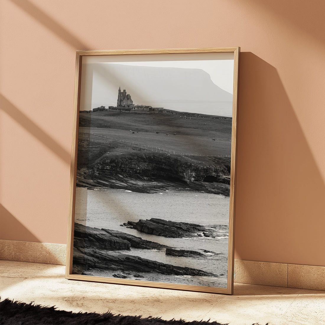 Framed Irish coastal print with Classiebawn Castle in soft natural light