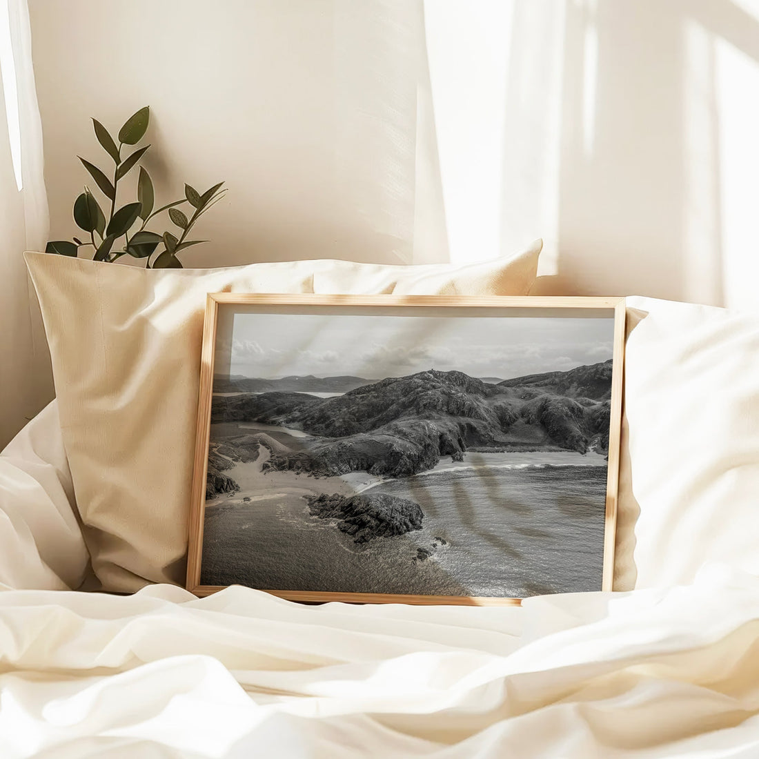 Monochrome framed photo of Murder Hole Beach resting on a soft bed in morning light.