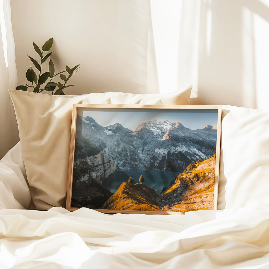 Serene nature wall art print featuring panoramic view of Oeschinensee nestled below towering Swiss Alps.