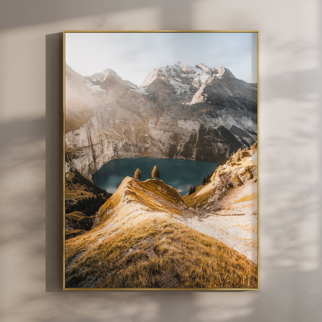 Scenic Oeschinensee alpine lake wall art print featuring golden mountain slopes and crystal-clear waters.
