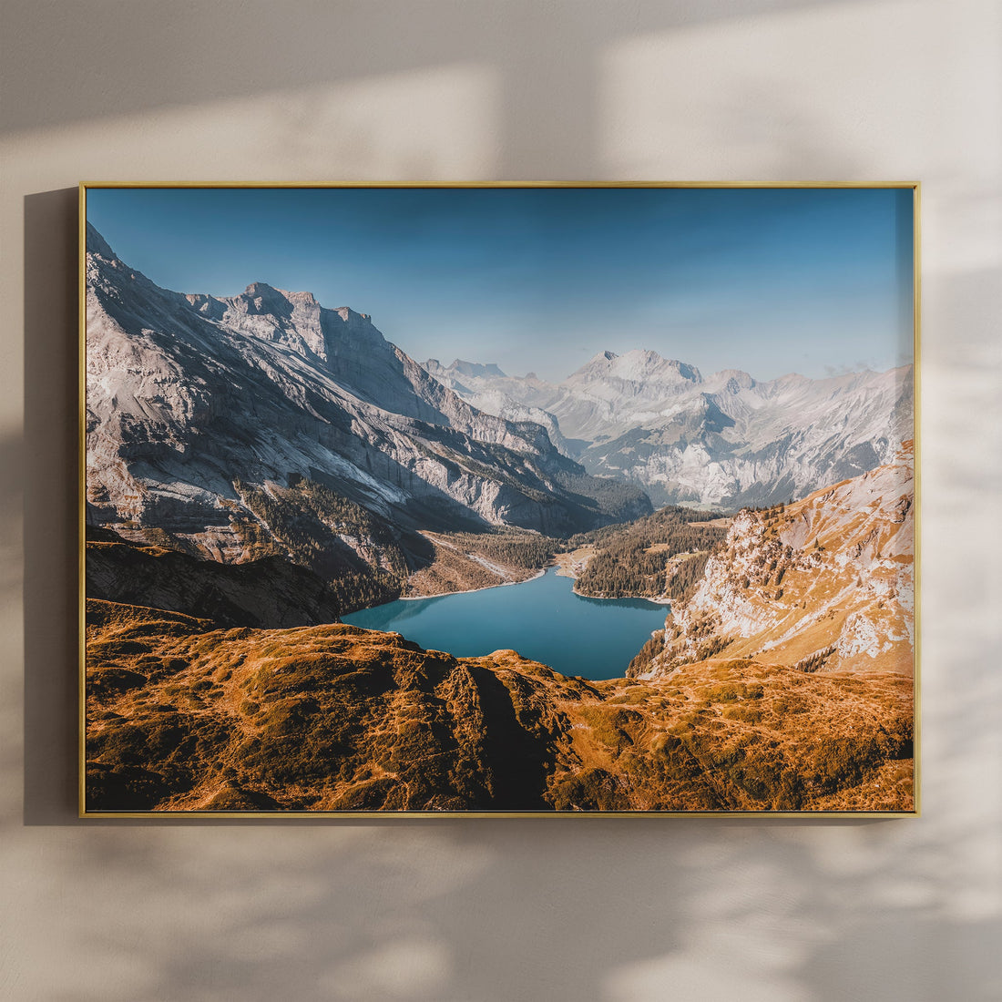 Fine art print of Oeschinensee lake surrounded by golden alpine slopes