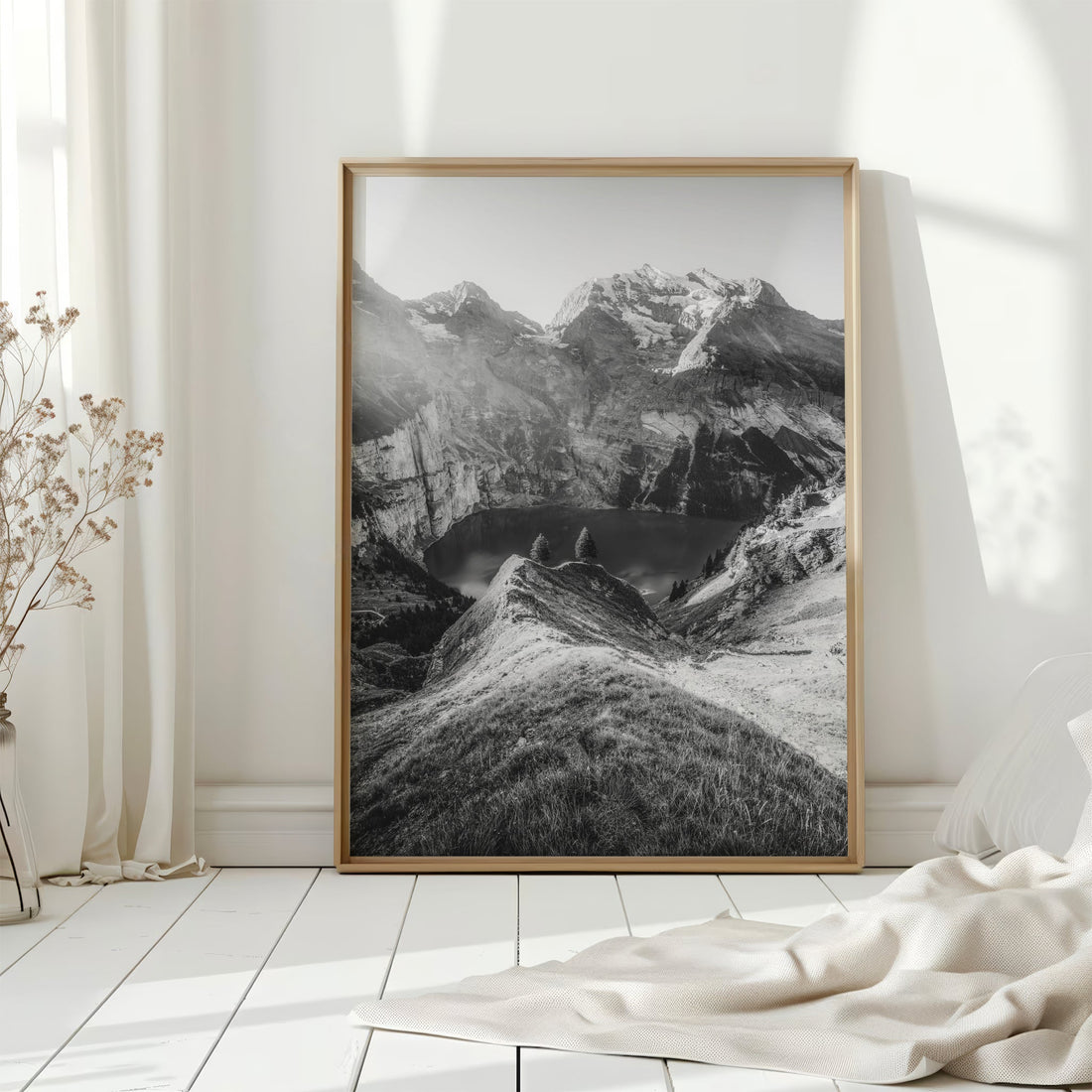 Beautiful Swiss Alps wall art featuring Oeschinensee at sunset, with warm light on the rugged mountain ridges.
