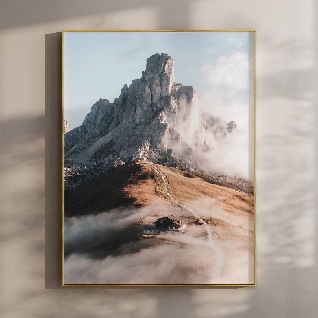 Breathtaking Passo Giau Dolomites wall art featuring misty peaks and golden alpine slopes.