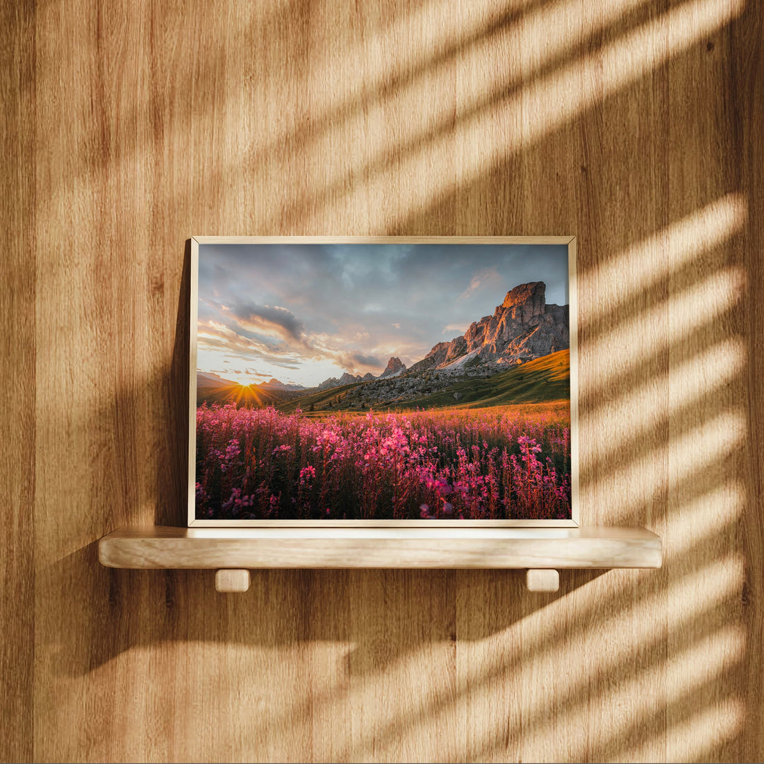 Passo Giau landscape art print featuring Italian Alps at sunset with glowing rock faces and blooming flowers.