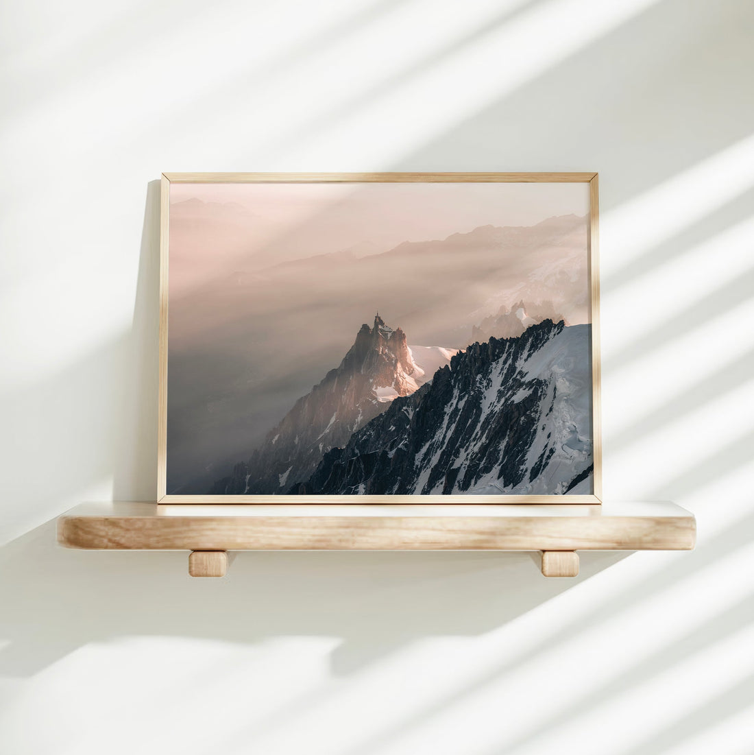 Scenic mountain print of Aiguille du Midi with soft pastel tones and sweeping alpine vistas at dawn.