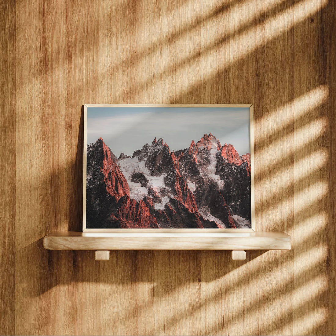 Premium framed mountain art featuring a majestic view of the Aiguilles in Mont Blanc massif.