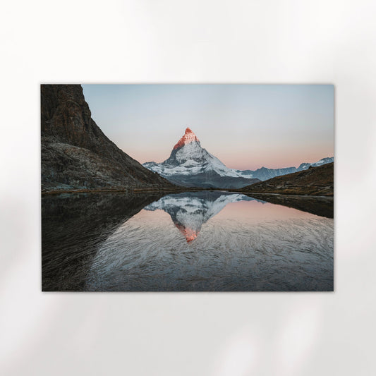 Riffelsee lake photography print showing a mirrored view of the Matterhorn at golden hour in Zermatt.