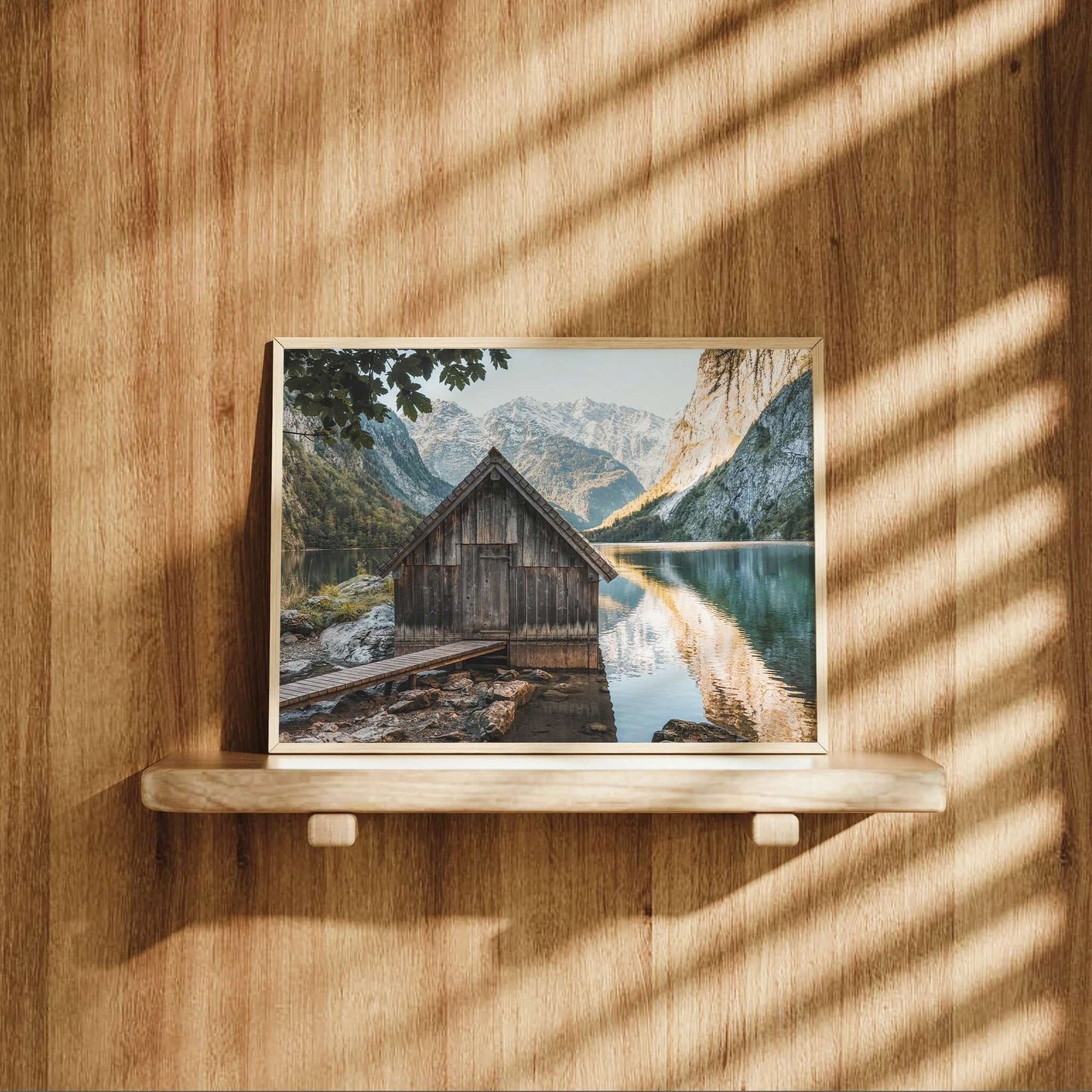 Rustic boathouse on the edge of a clear alpine lake in Germany