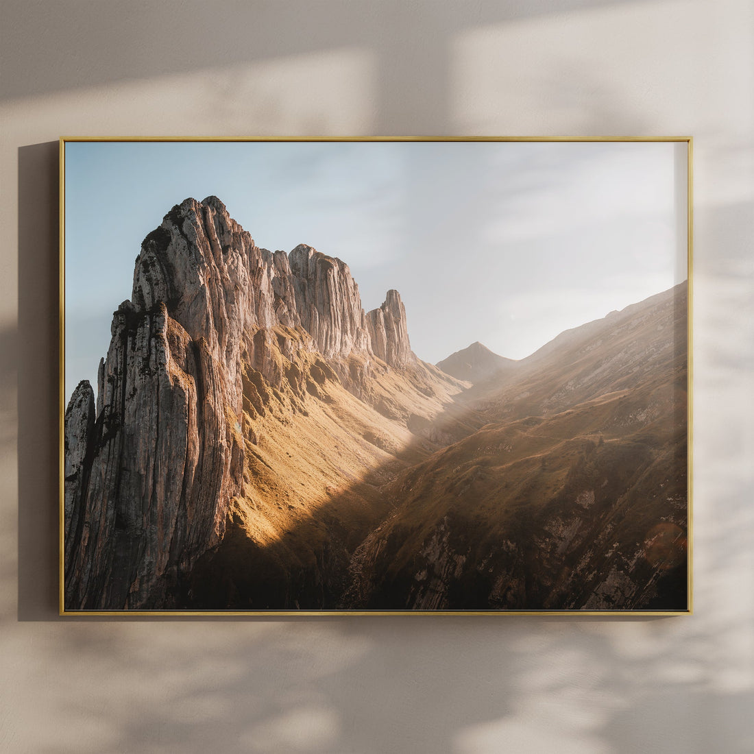 Bold Saxer Lücke wall art print of jagged Swiss Alps ridges bathed in golden morning light.