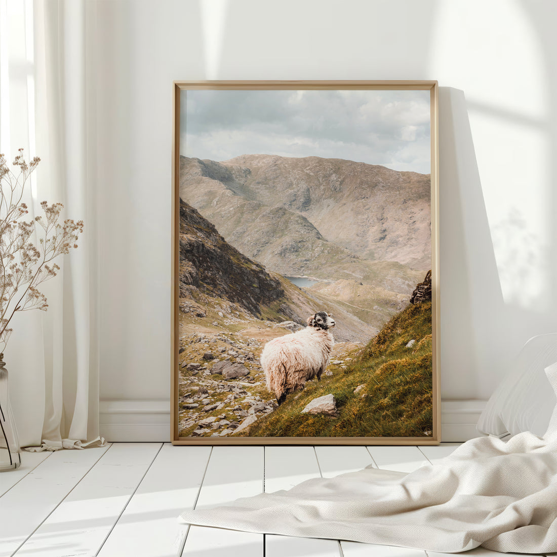 Framed print of the Old Man of Coniston in soft white decor with morning light.