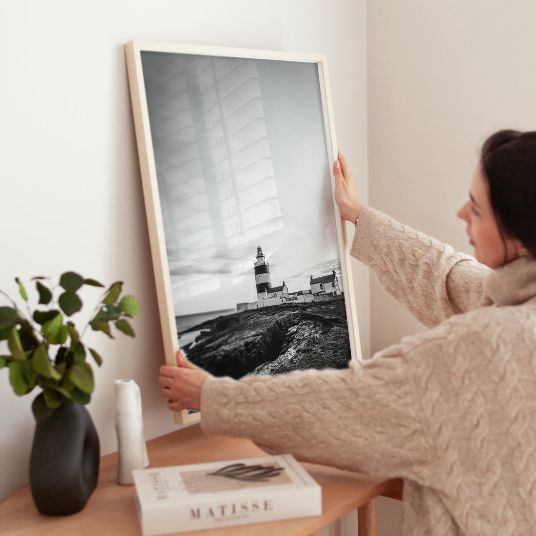 Woman styling a home with Hook Head Lighthouse fine art print