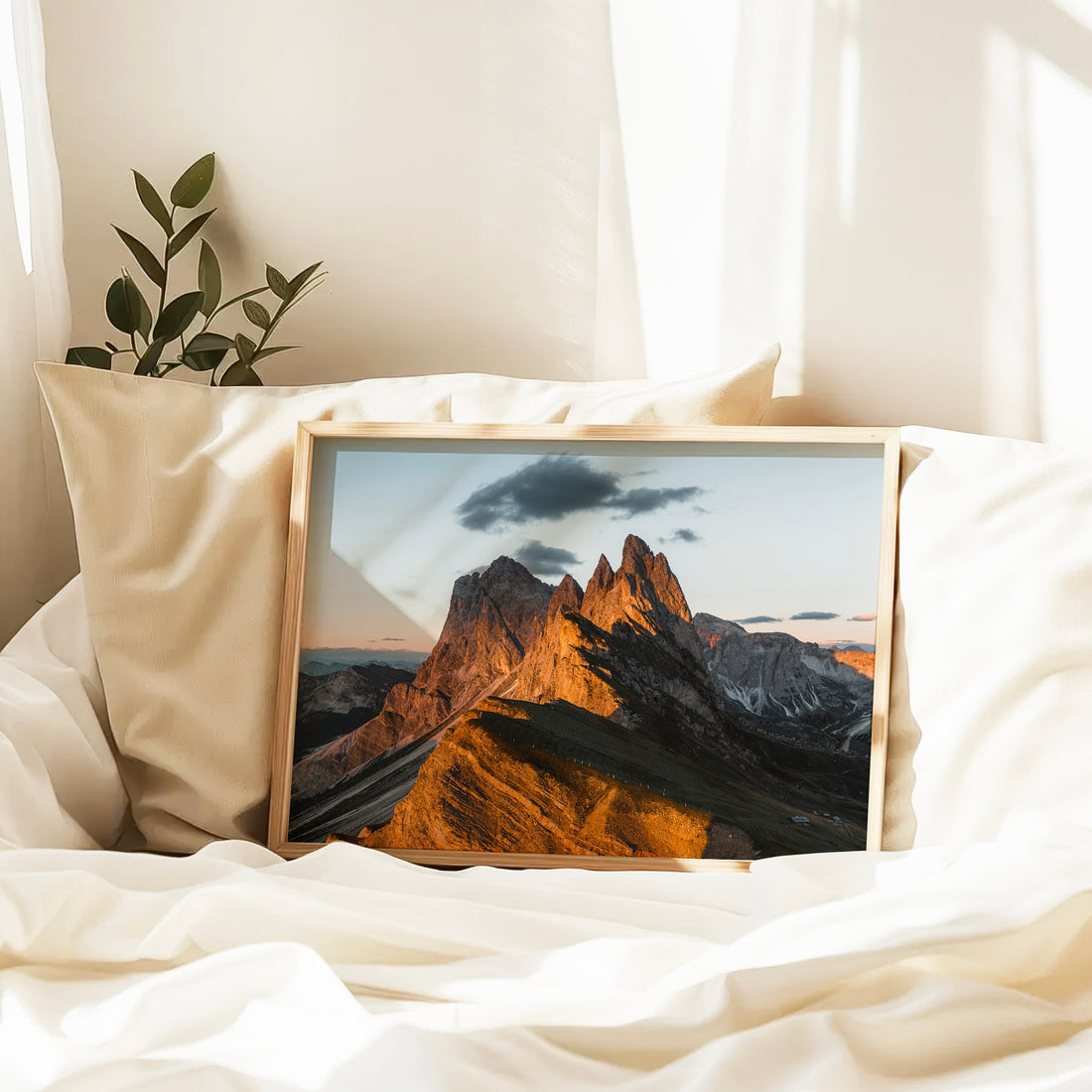 Modern wall decor featuring the Seceda mountain ridge bathed in warm evening light.