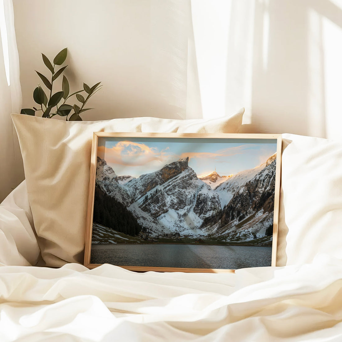 Golden hour alpine photography print of Seealpsee’s rugged winter peaks catching the last sunlight.