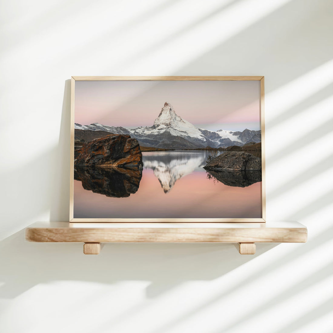 Serene Matterhorn fine art print with a calm alpine lake reflection captured from Stellisee at sunrise.
