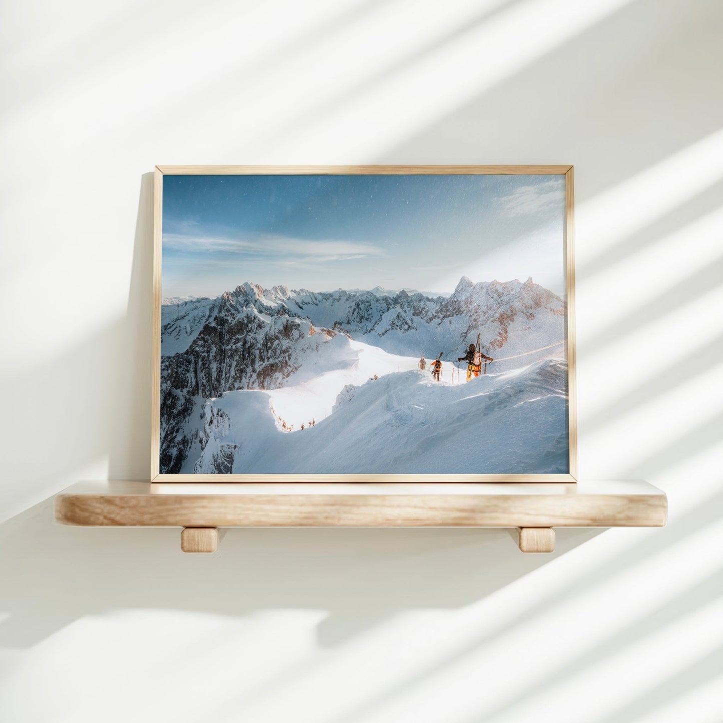 Wall art photo of ski tourers departing Aiguille du Midi on the Vallée Blanche route, Chamonix, France.