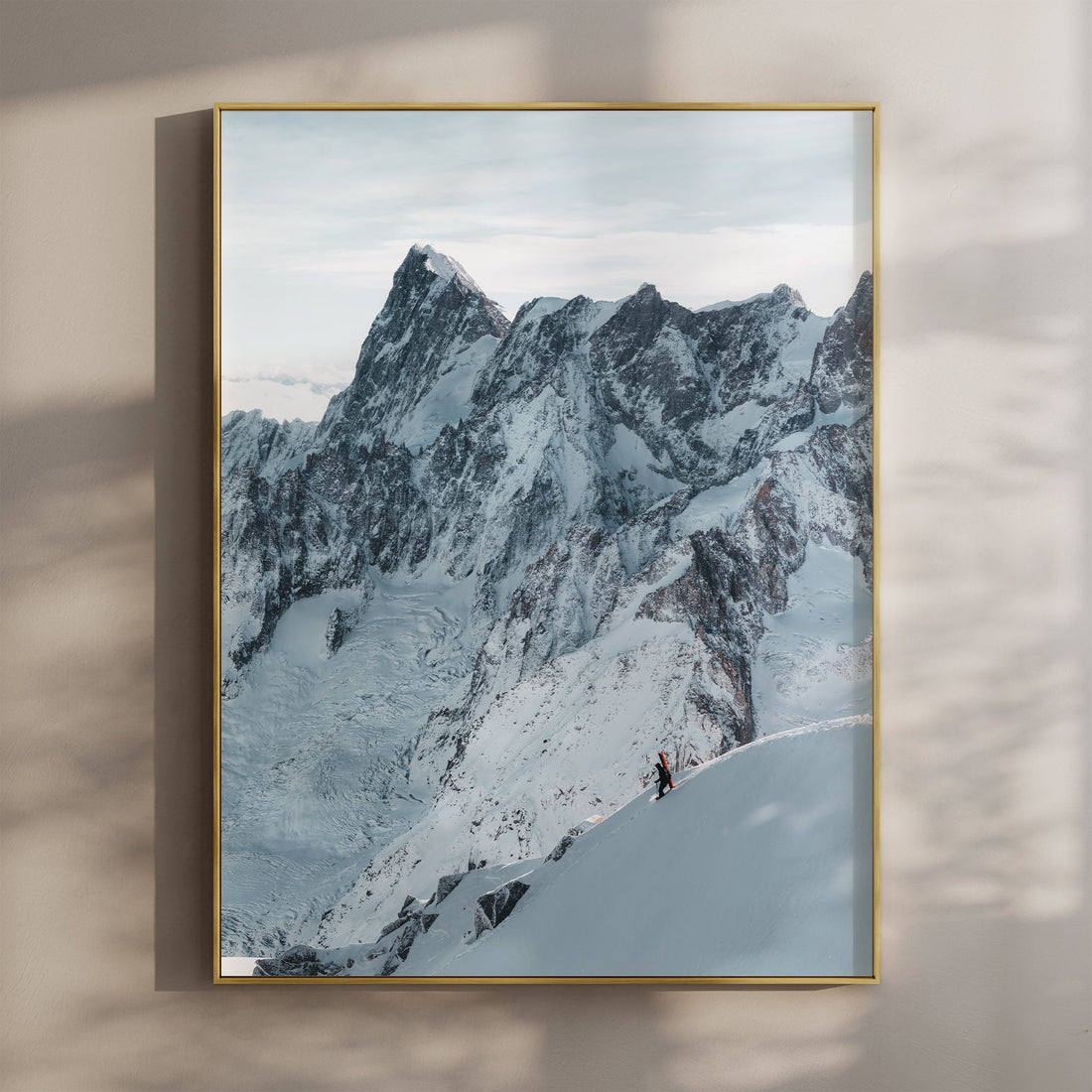 Stunning wall art of a skier descending the Midi Arete with the dramatic French Alps in the background.
