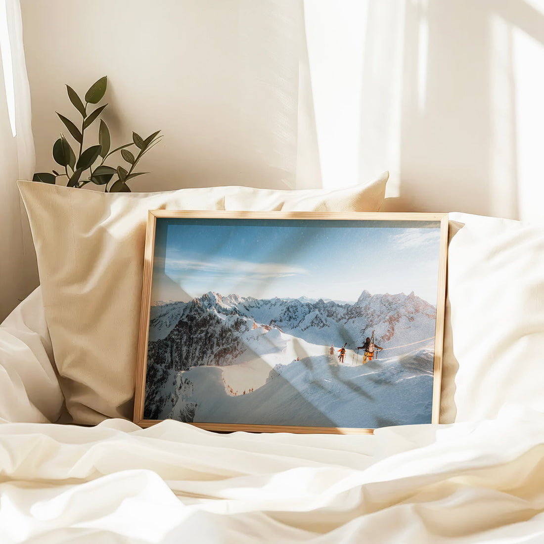 Scenic alpine print capturing a winter mountaineering route in the French Alps with clear skies.