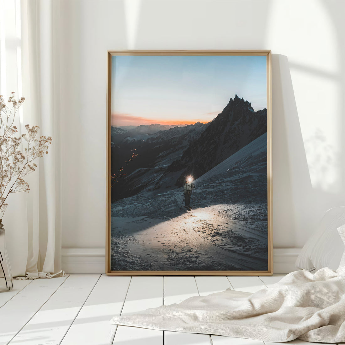 Framed fine art photo print of mountaineer lit by headlamp in snowy Chamonix