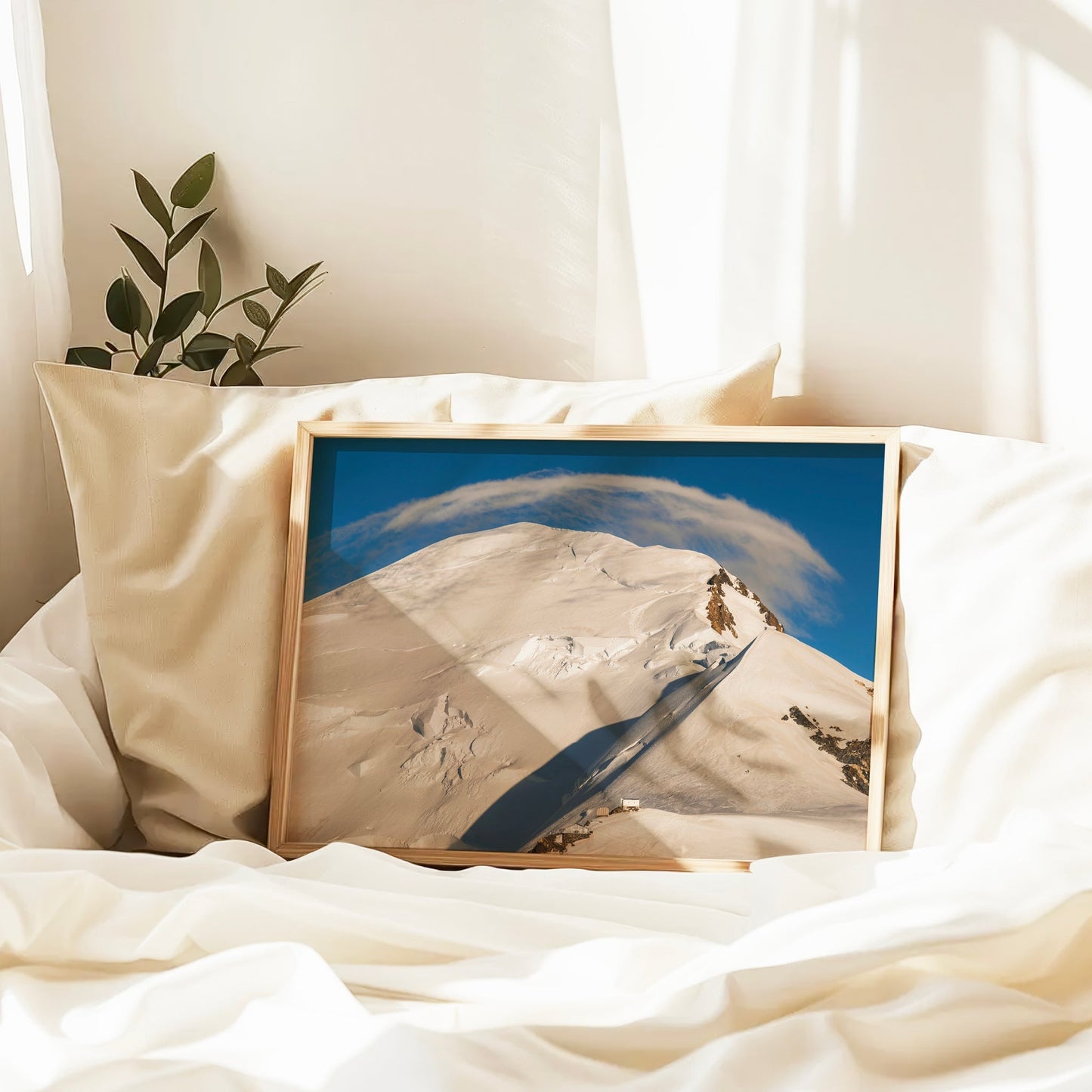 Wall art photography print of a snowy summit trail on Mont Blanc with rich shadows and dramatic elevation.