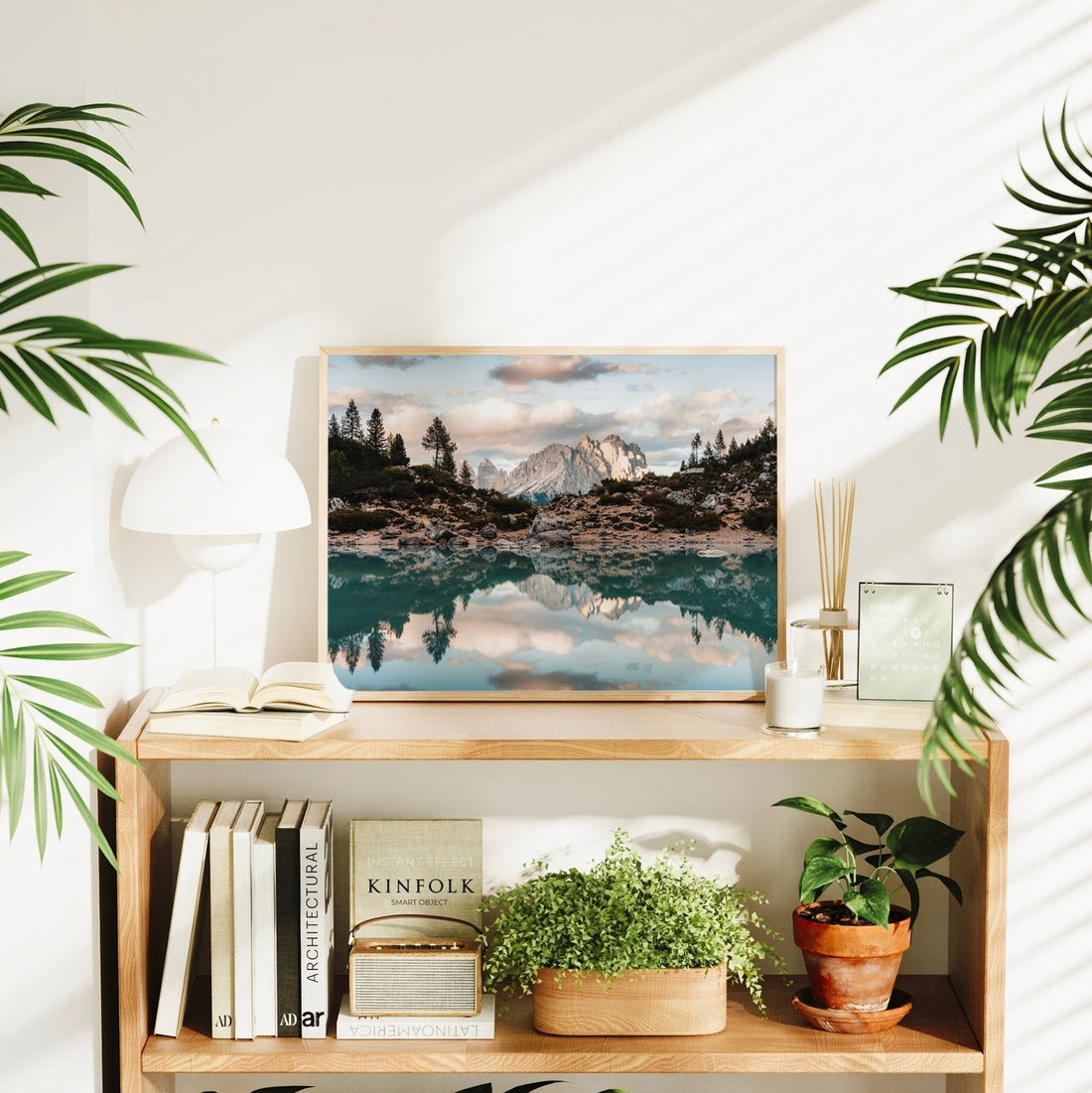 Tranquil mountain wall art with reflections on Lago di Sorapis, framed by pine trees and dramatic Dolomite rock faces.