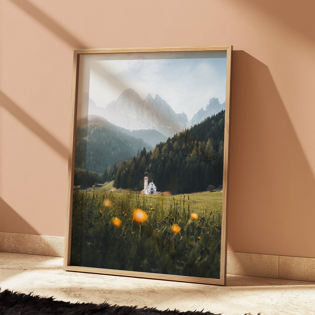 Warm-toned room with St. John’s Church wall art and dramatic Dolomites peaks