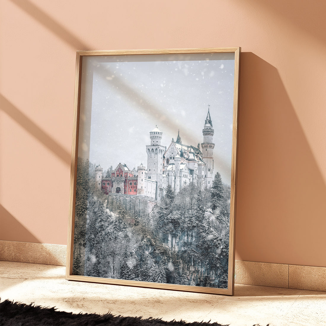 Neuschwanstein Castle wall print lit by afternoon sunlight in peach-toned space