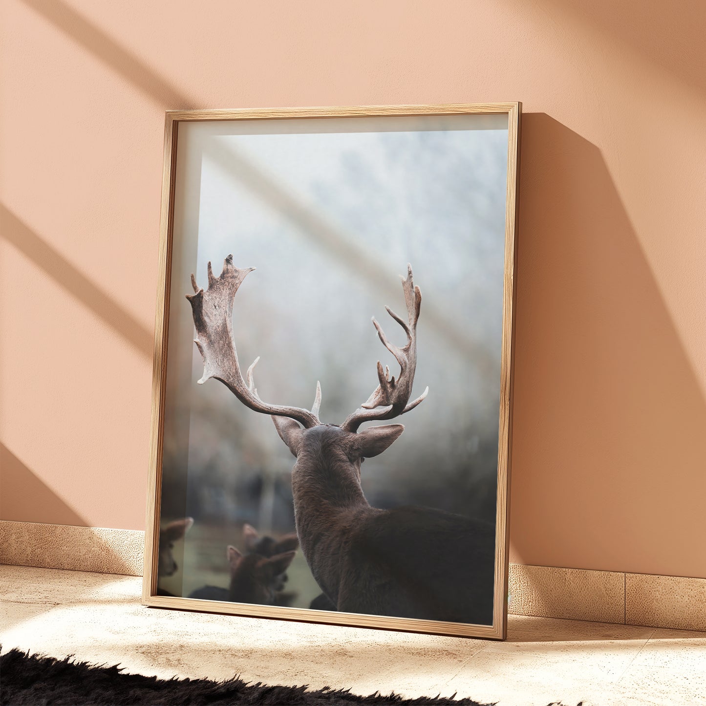 Fine art photography of a stag in Bavaria with fog and soft tones