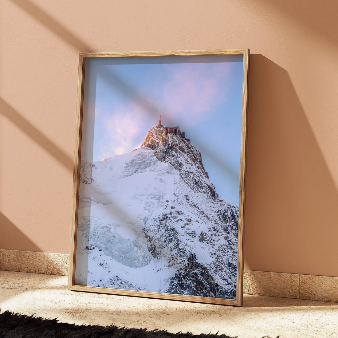 Striking landscape print of Aiguille du Midi, bathed in soft morning light over the French Alps.