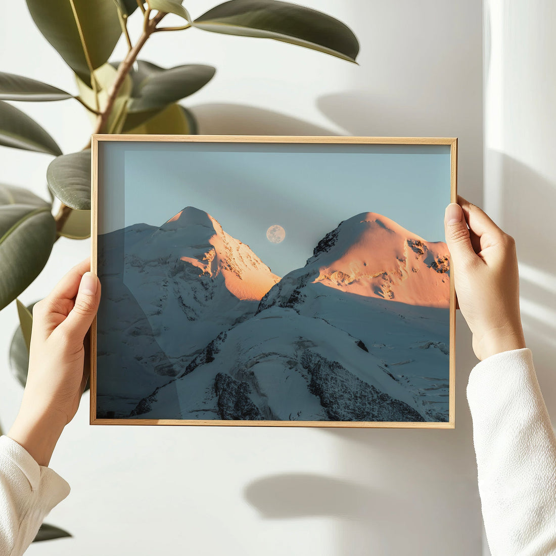 Breathtaking Swiss mountain wall art of Castor and Pollux lit by soft sunrise light with moon in the background.