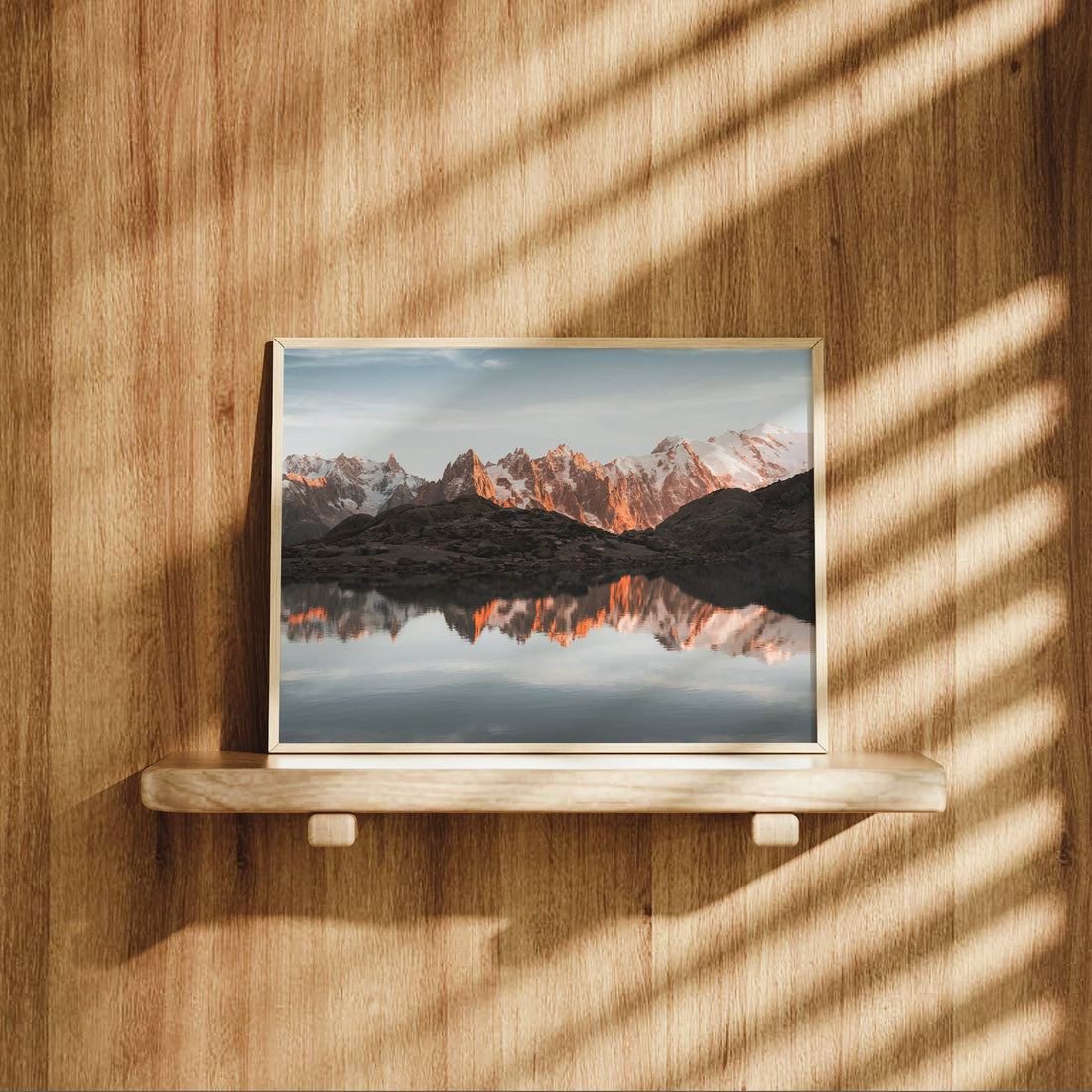 Landscape photo print of sunrise over Mont Blanc with vivid orange peaks mirrored in Lac Blanc.