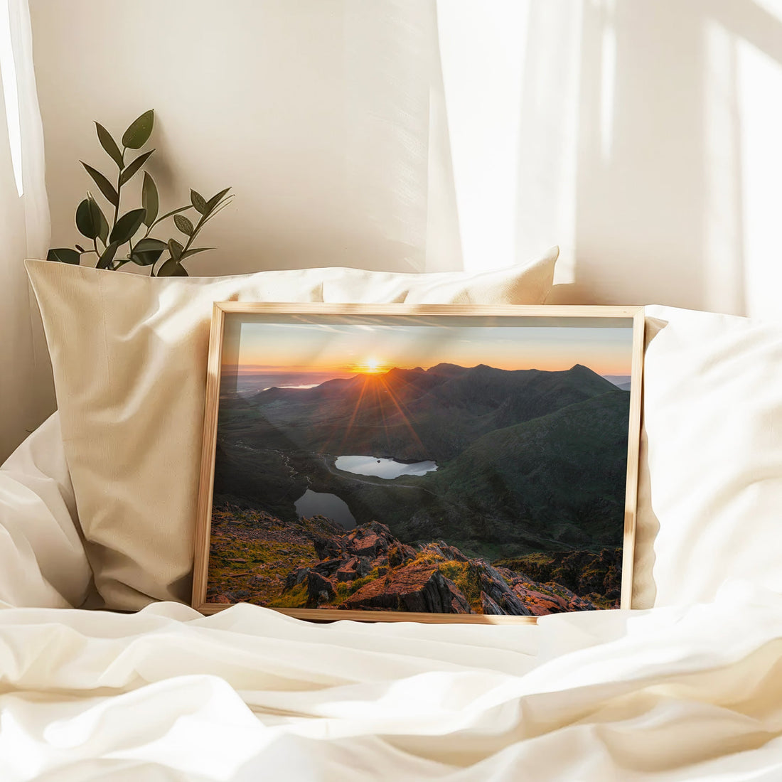 Framed Carrauntoohil sunrise print placed in soft morning light.