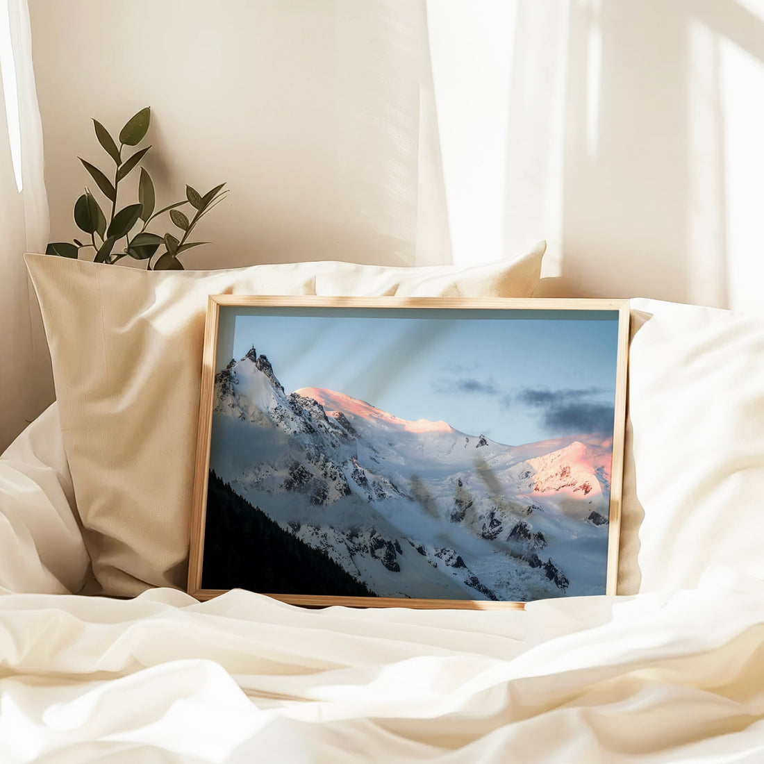 Serene photography print capturing Aiguille du Midi with warm light kissing its summit.