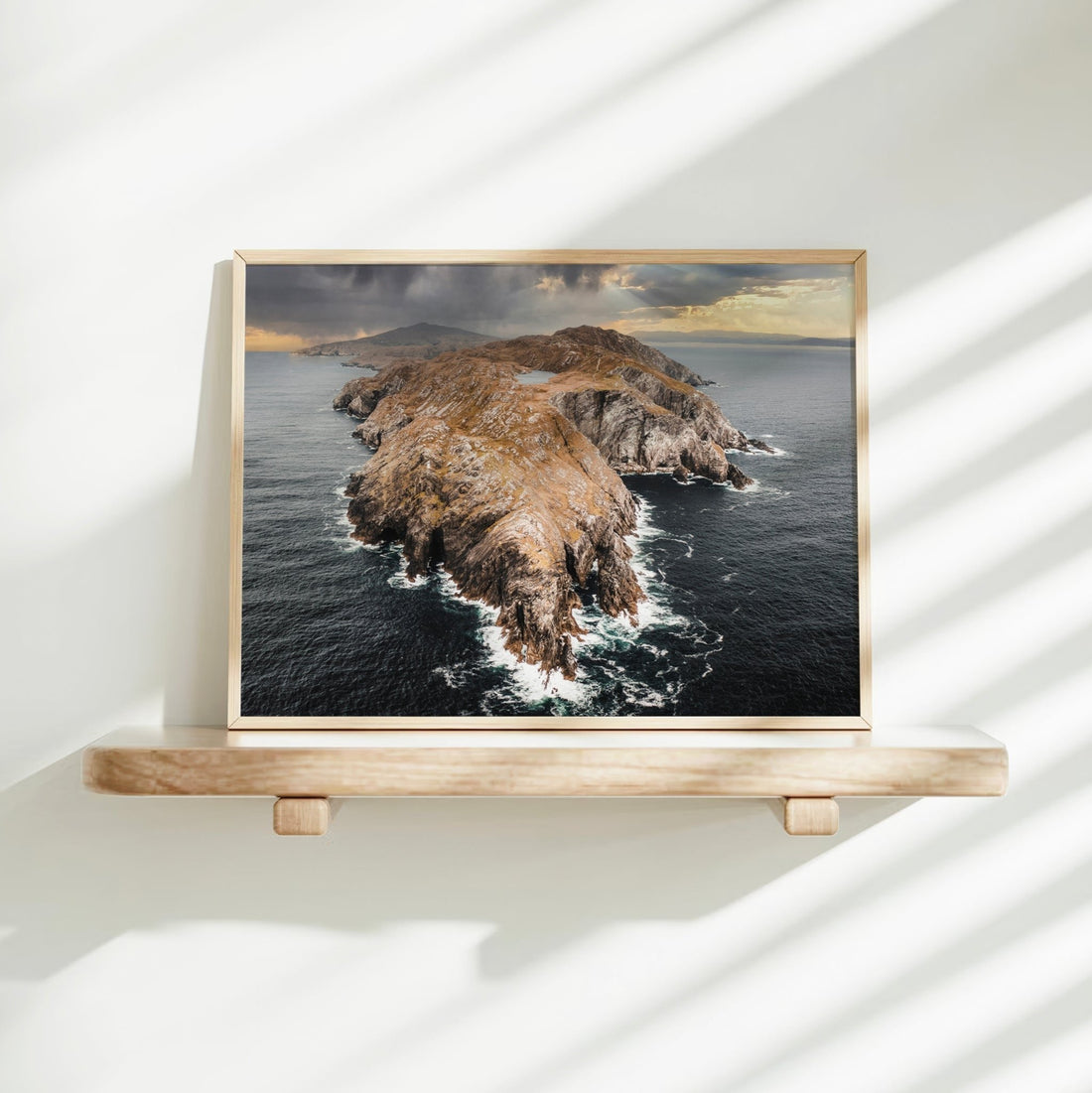 Framed Sheep’s Head Ireland print on shelf with soft natural shadows.