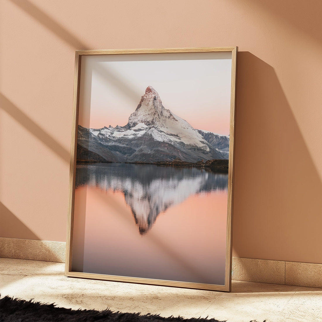 Dramatic sunset photography print with the Matterhorn’s silhouette mirrored in the tranquil Stellisee.