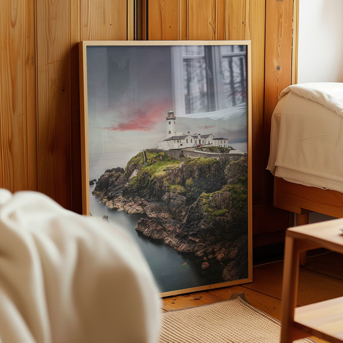 Fanad Lighthouse wall art styled on wooden bedroom floor