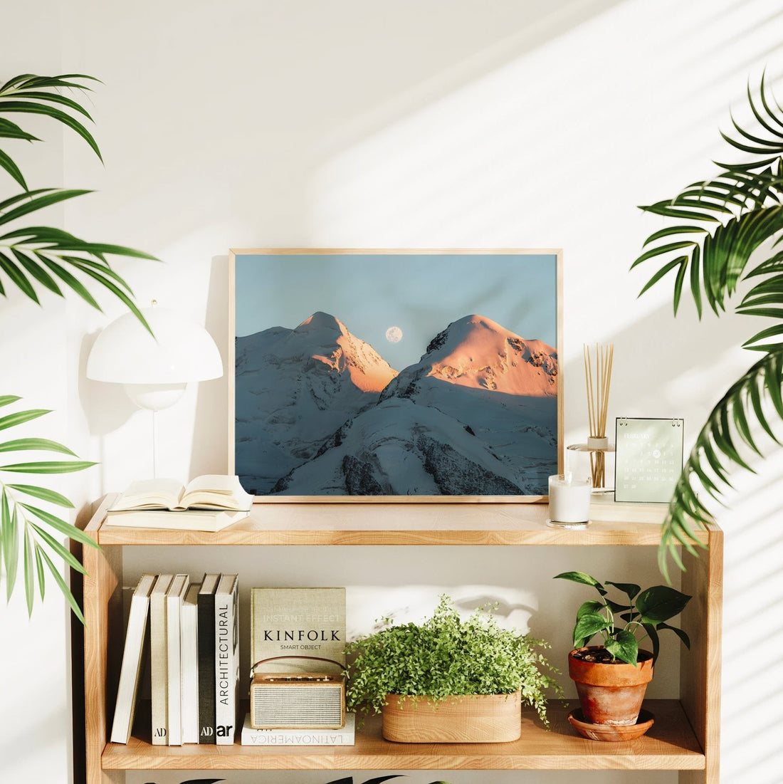 Minimalist fine art photography of the full moon rising above Castor and Pollux in the snowy Swiss Alps.