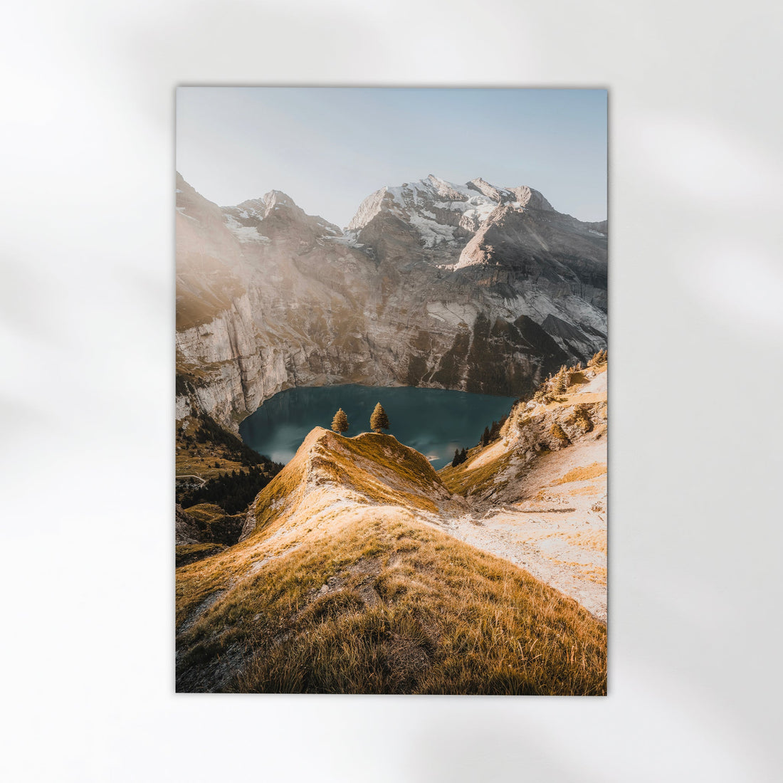 Stunning fine art print of Oeschinensee in the Swiss Alps, showcasing pristine lake reflections and dramatic peaks.
